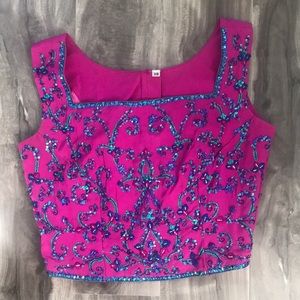 Pink lehengha with blue and sea green detail